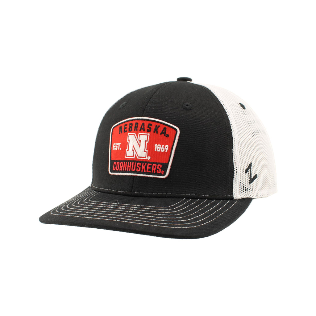 Nebraska Cornhuskers NCAA Officially Licensed Trucker Hat Dakota Switchback Patch Black White