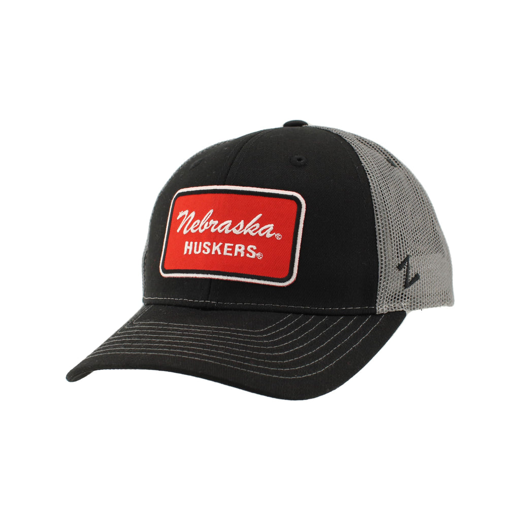 Nebraska Cornhuskers NCAA Officially Licensed Trucker Hat Dakota Patch Brick Black Smoke